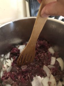 Saute onions and ground meat